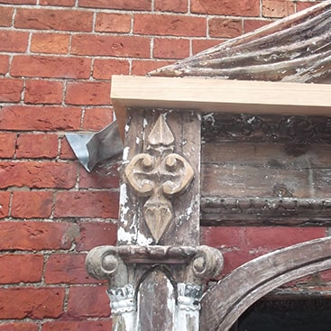 Wooden door surround restoration